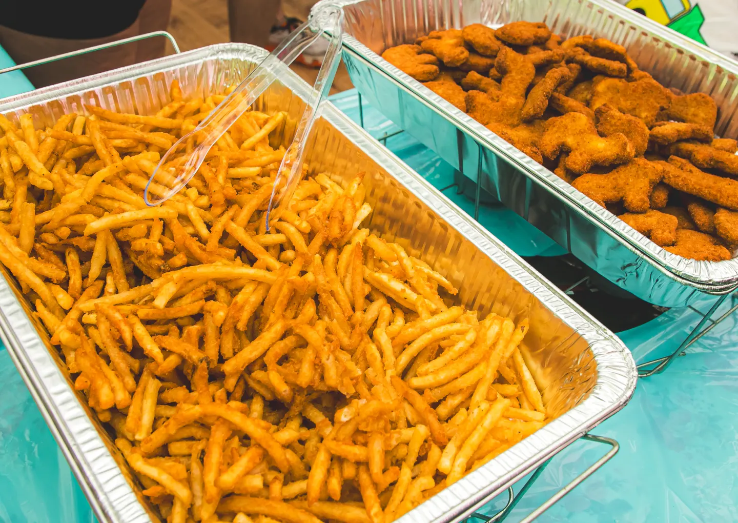 Fries and chicken tenders set out for a family party at Uncle Rocco